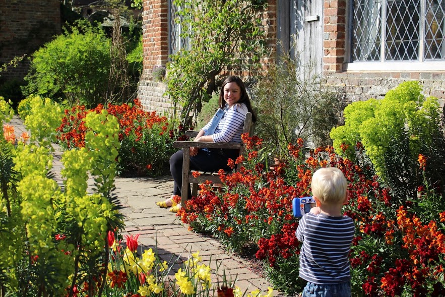Max taking a photo of me in Sissinghurst Cottage Garden