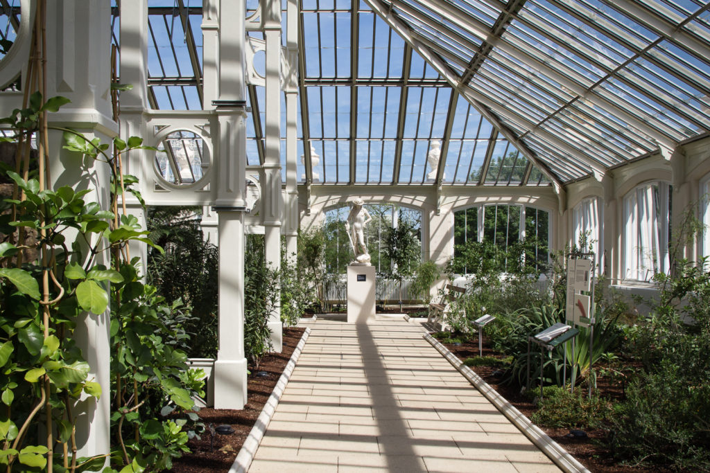 The Temperate House at Kew Gardens, view down the pathway with a statue at the end